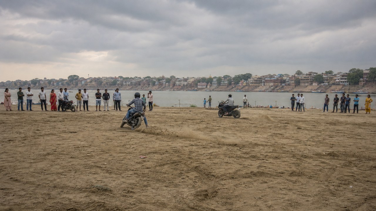 Dangerous Bike Stunts On Ganga Sandbanks Raise Safety Concerns In Varanasi