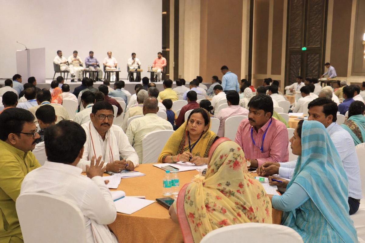 Rural elected representatives attending a policy conference at a modern convention centre in Varanasi