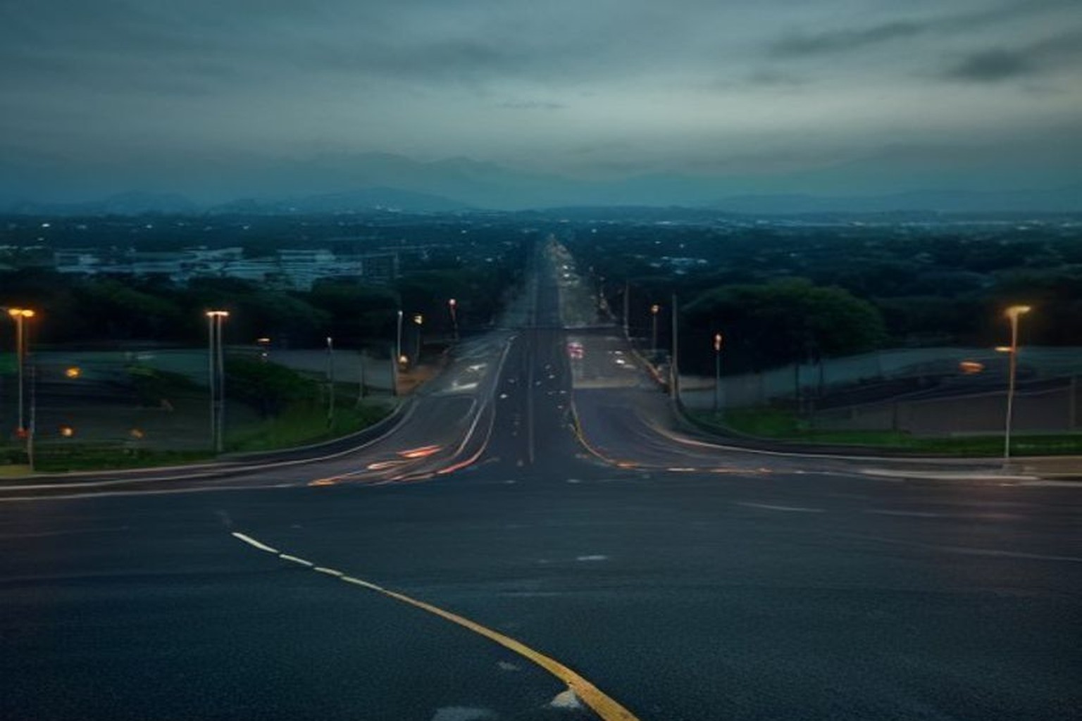 Illustrative empty Golf Course Road roundabout at dusk with soft streetlight glow and wet asphalt reflection, India documentary landscape, absolutely no people, absolutely no text no letters no numbe…