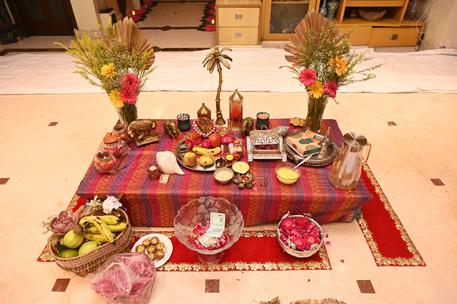 Puja thalis and offerings laid out for the occasion Karwa Chauth get-together, Varanasi