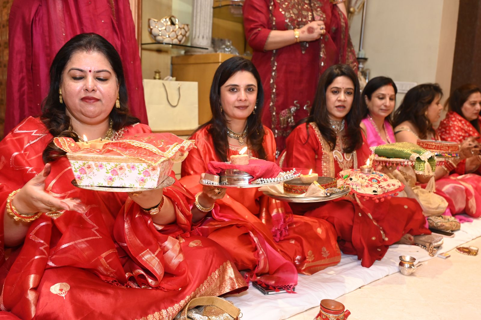Guests with their thalis during the gathering Karwa Chauth get-together, Varanasi