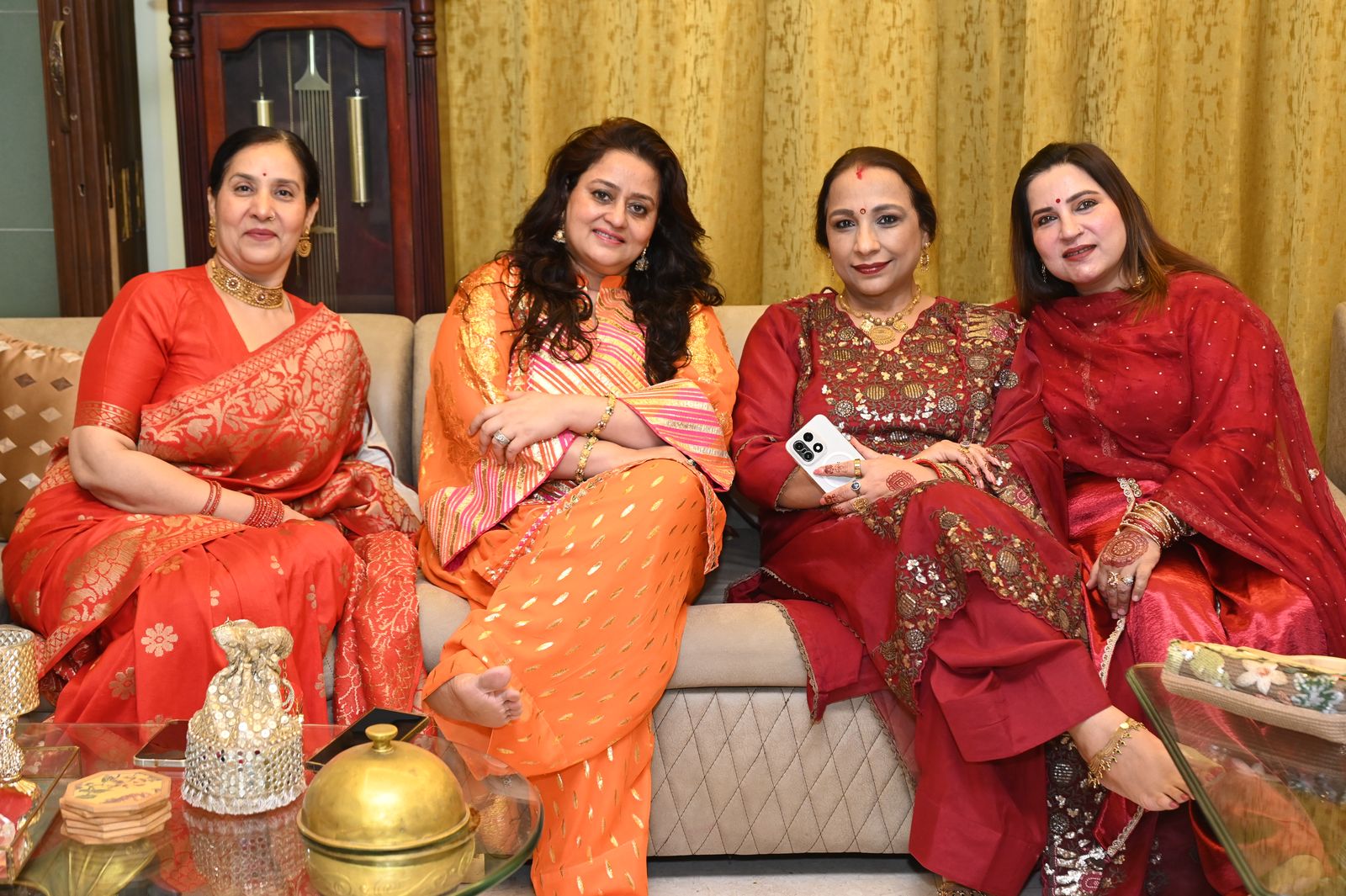 Guests share a moment during the gathering Karwa Chauth get-together, Varanasi