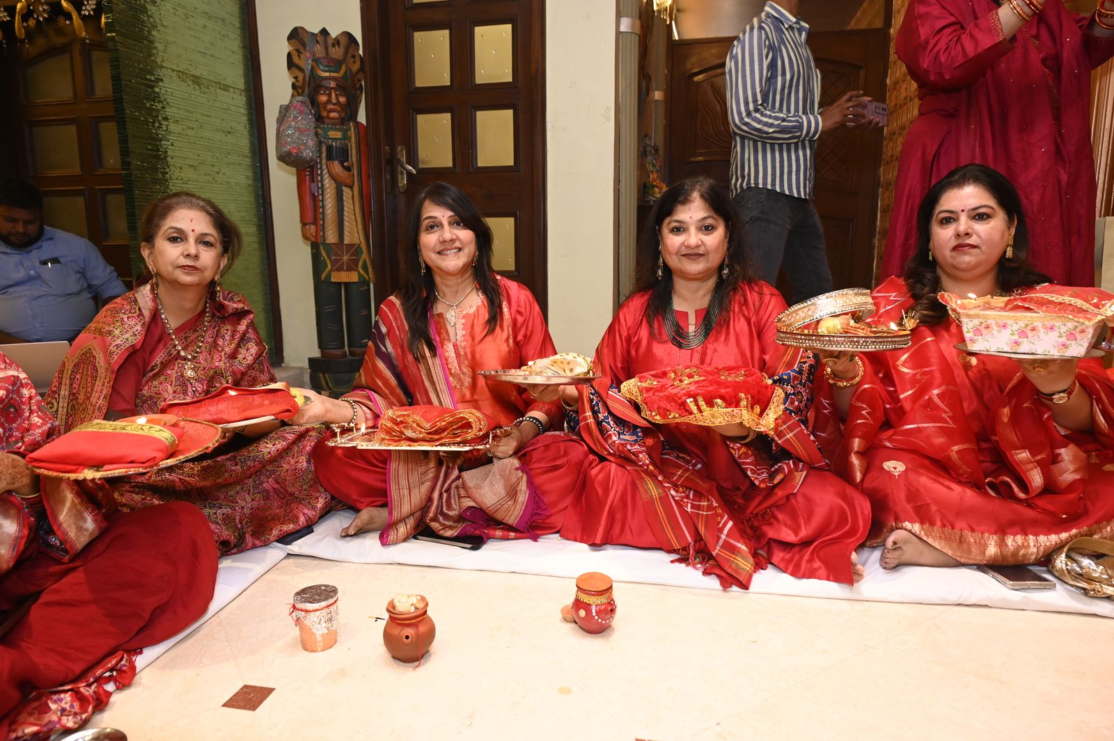 Guests with their puja thalis, Karwa Chauth get-together, Varanasi