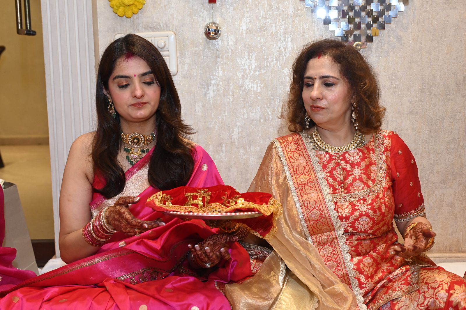 Guests with their puja thalis, Karwa Chauth get-together, Varanasi
