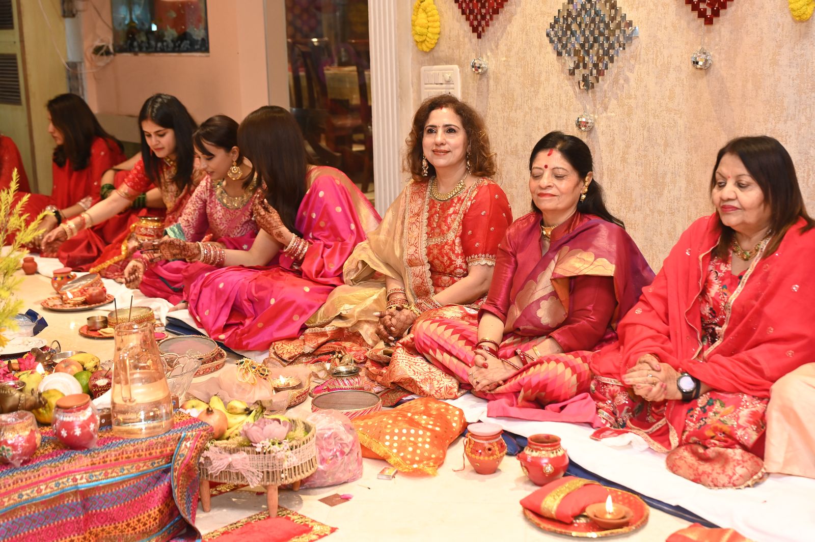 Guests with their puja thalis, Karwa Chauth get-together, Varanasi